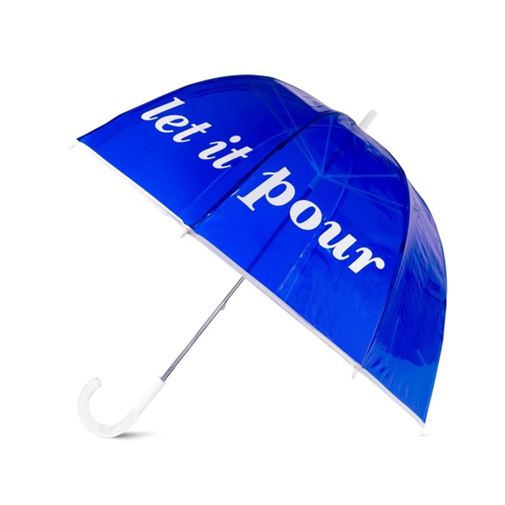 Kate Spade New York transparent blue vinyl umbrella with curved white handle, canopy is open with "let it pour" in white lettering.