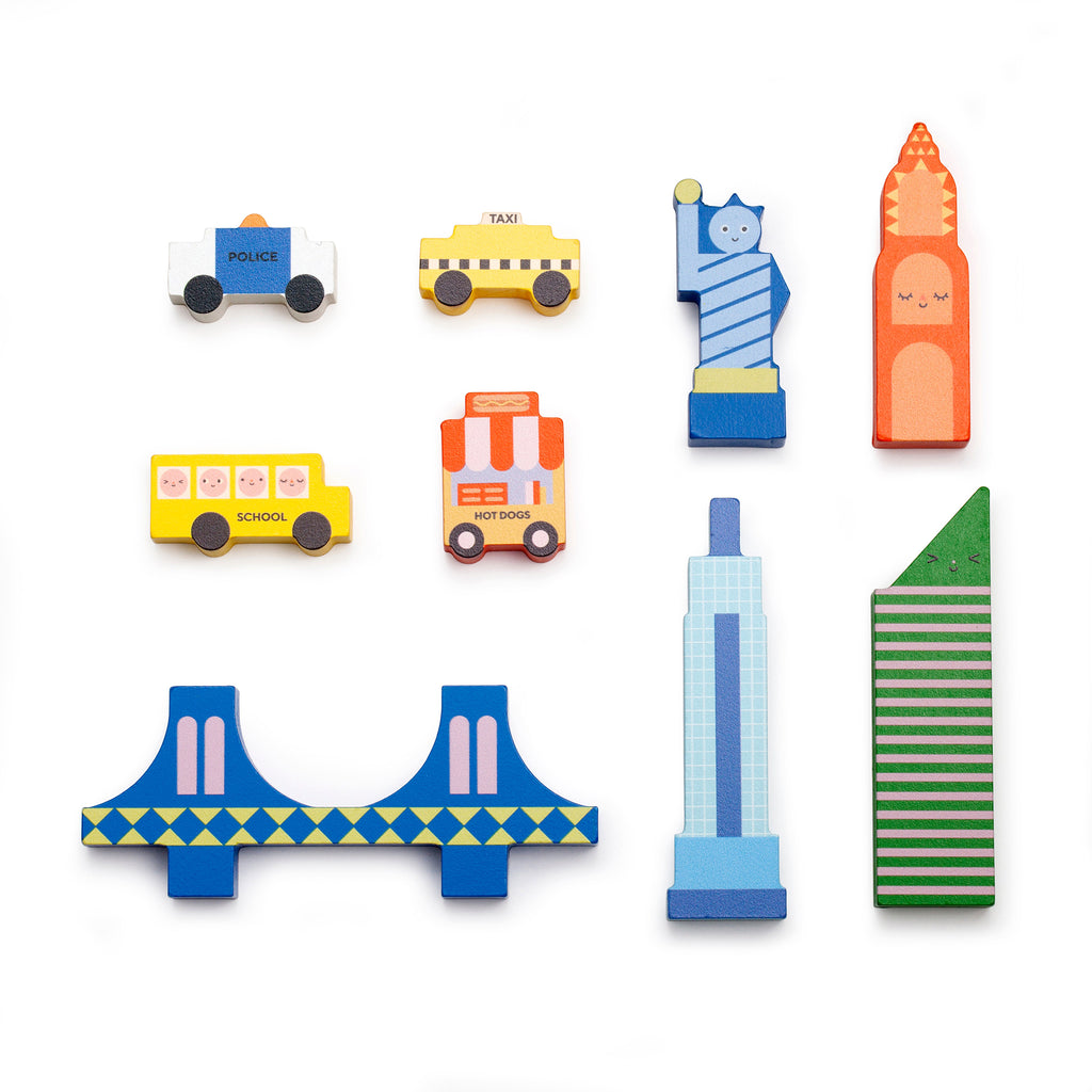 Kikkerland New York City city in my pocket wood playset, 9 pieces shown on white background.