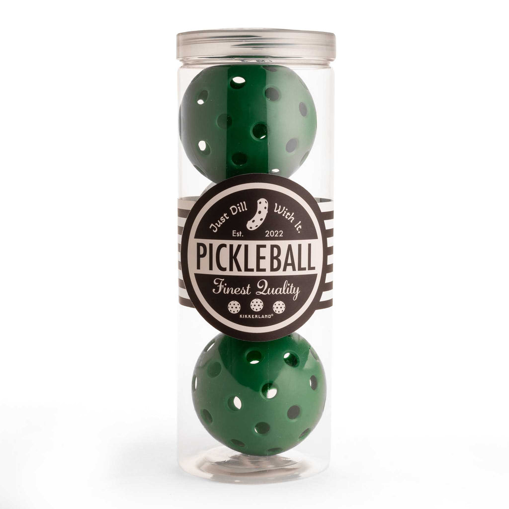 Kikkerland set of 3 dark green pickleball balls in clear tube packaging.