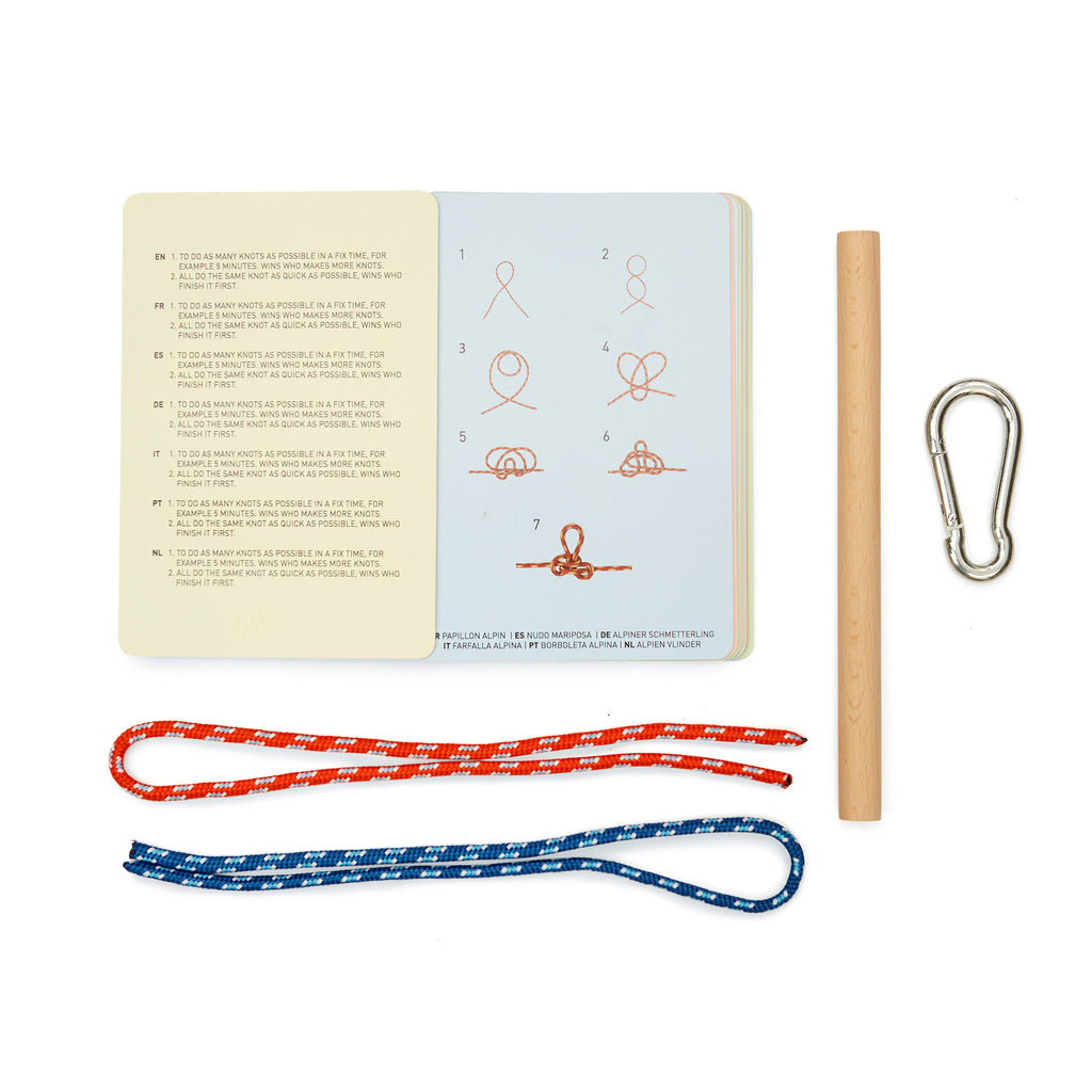 Kikkerland Knot Game contents including knot cards, a wood stick, a metal carabiner and a piece of red and a piece of blue rope.