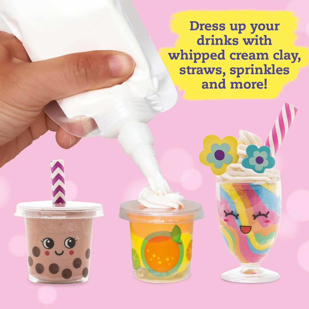 Klutz Mini Shake Shop Book and Activity Kit, sample of projects with hand squeezing "whipped cream" clay on a drink.
