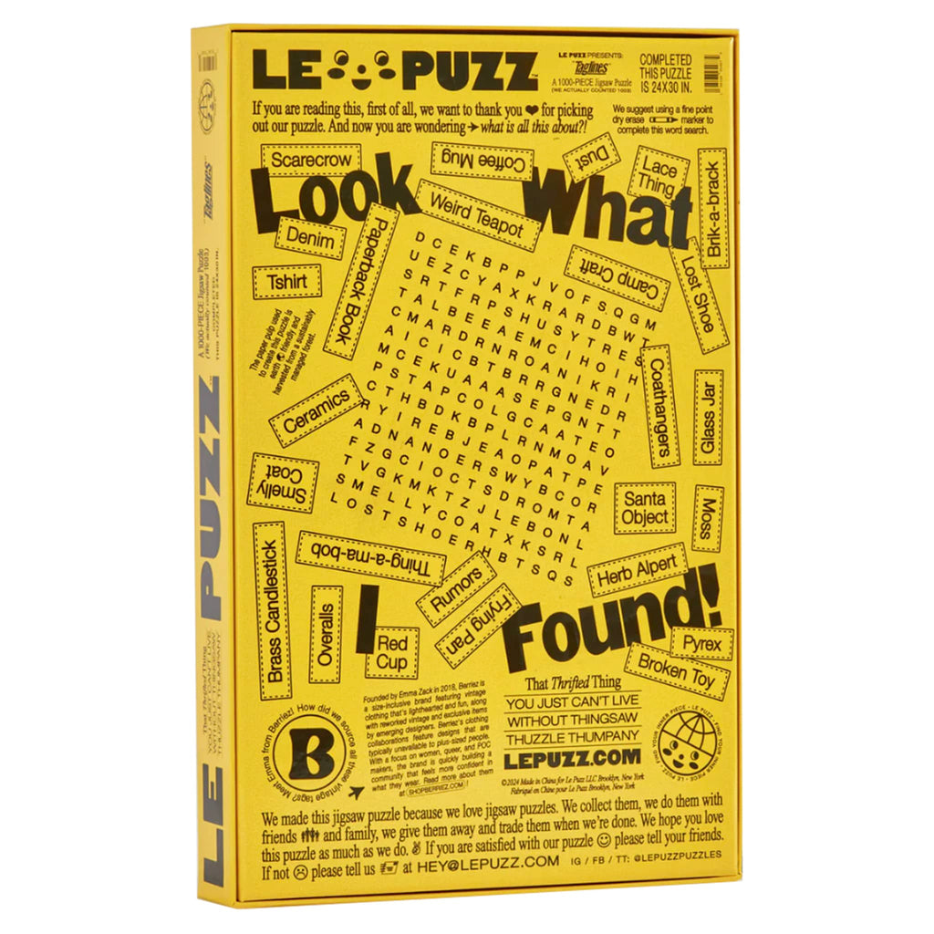 Le Puzz 1000 piece Taglines jigsaw puzzle in box packaging, back angle.