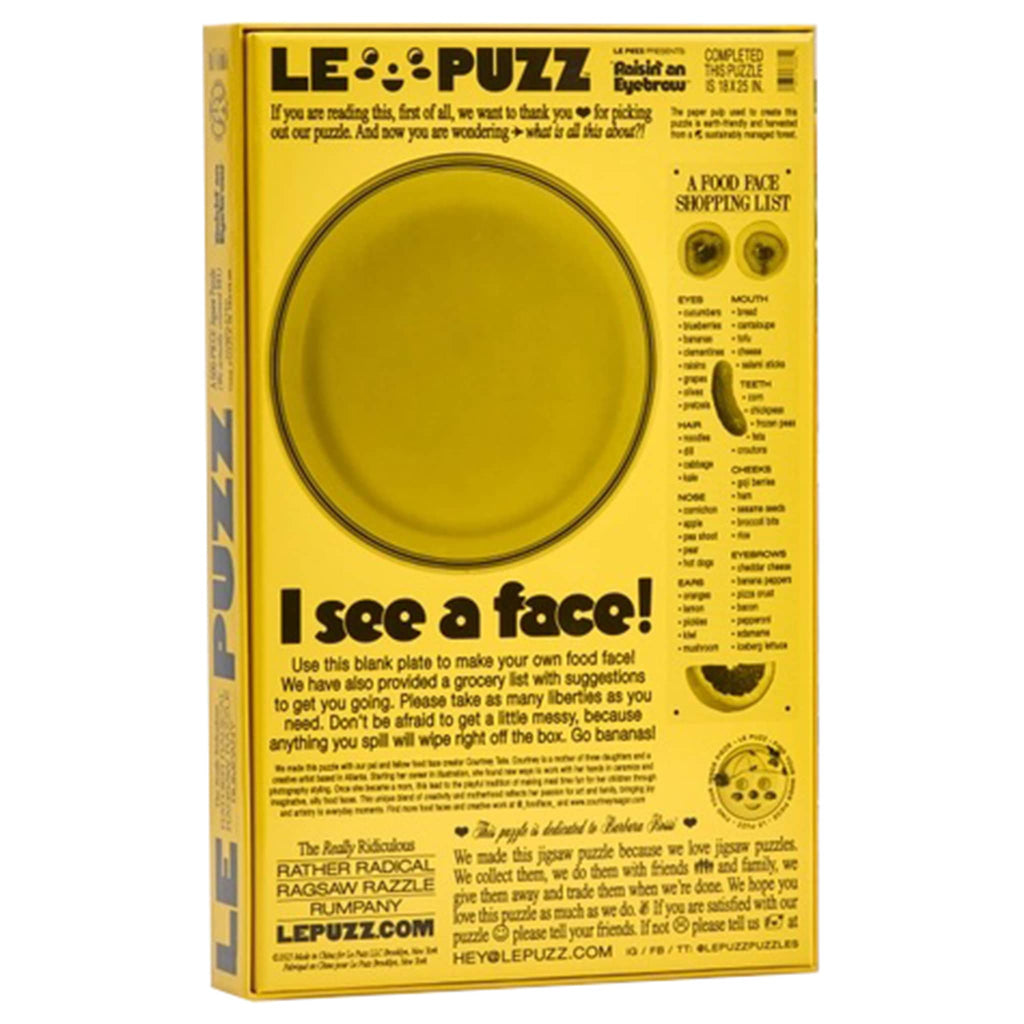 Le Puzz 500 Piece Raisin an Eyebrow jigsaw puzzle in box packaging, back angle view.