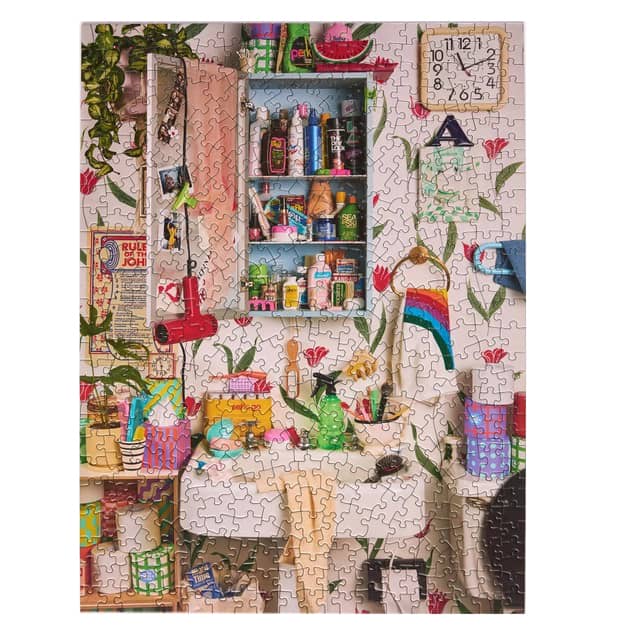 LE PUZZ puzzle with colorful photo of a bathroom scene on a white background.