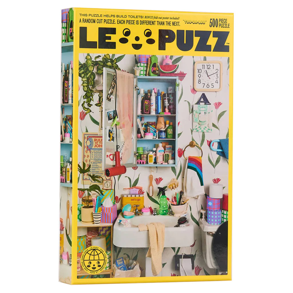 LE PUZZ puzzle box front with colorful photo of a bathroom scene.