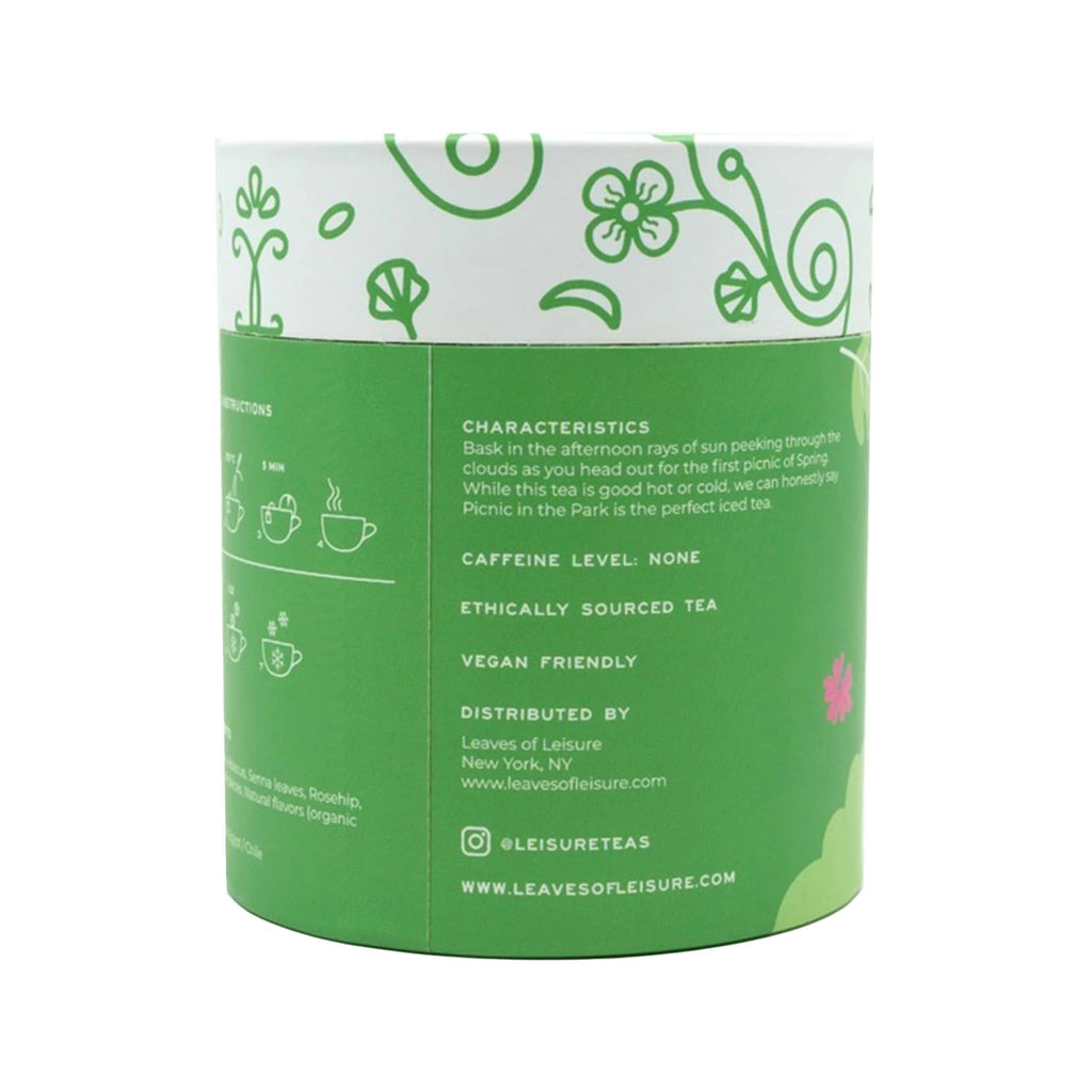 Leaves of Leisure Picnic in the Park Caffeine-Free Organic Herbal Tea in illustrated green canister packaging, back view.