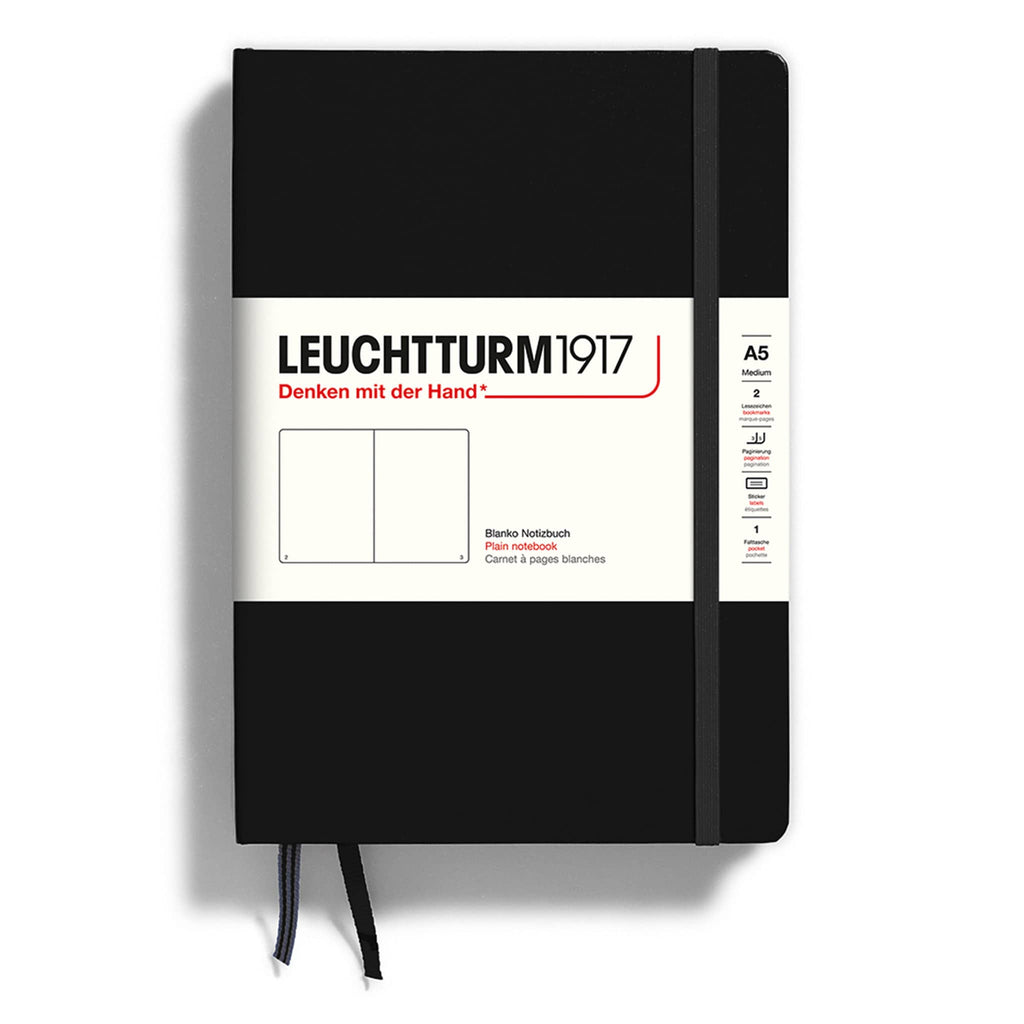 Leuchtturm1917 hardcover A5 medium notebook with plain pages and a black cover and elastic band.