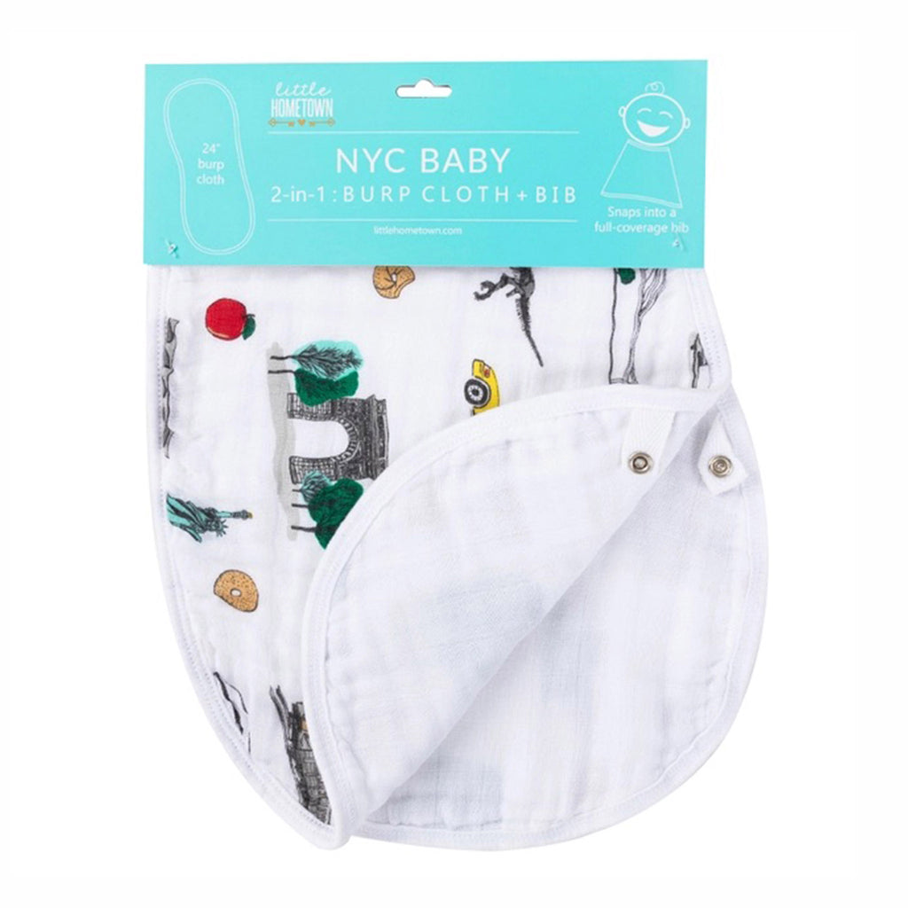 Little Hometown NYC Baby 2-in-1 Burp Cloth and Bib made from a bamboo and cotton blend muslin with illustrations of NYC icons on a white background, shown in packaging and folded back to show snaps.