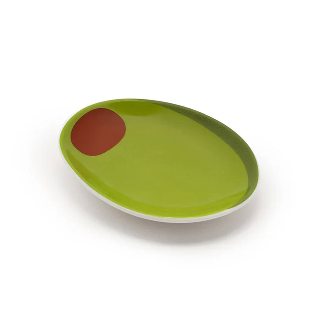 Olive-shaped ceramic trinket tray painted green with a red circle on a white background.