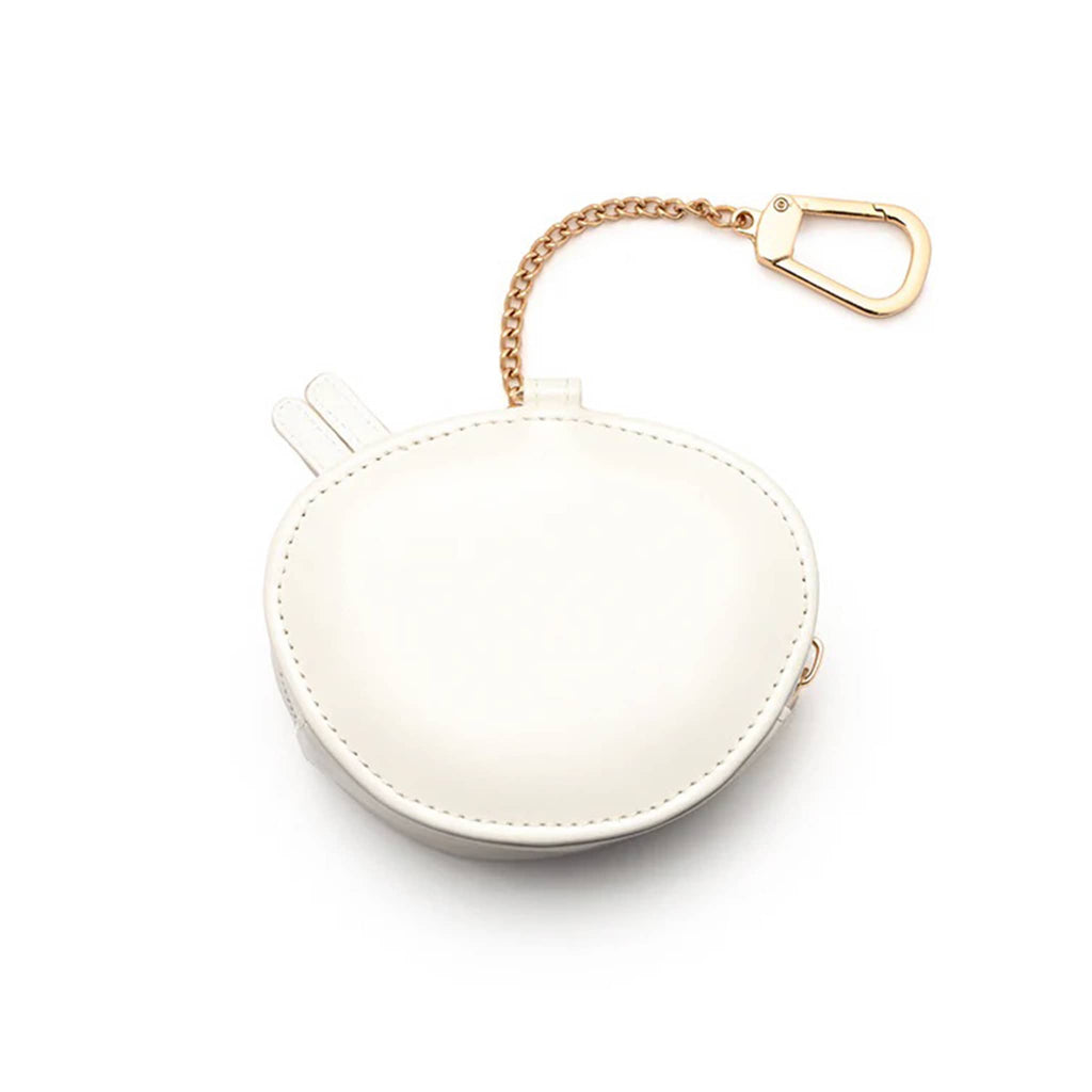 White circular bag charm with gold keychain on a white background.