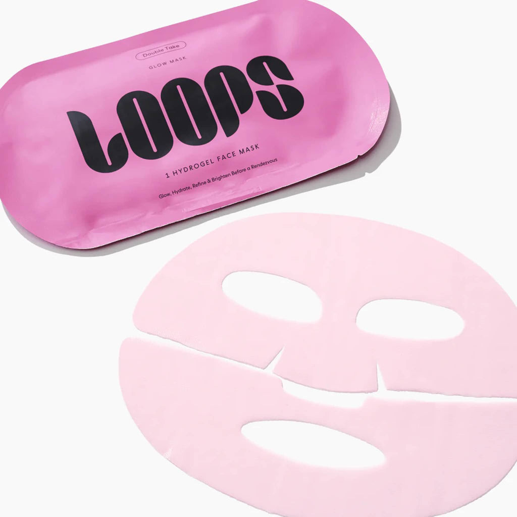 Pink hydrogel face mask with 'LOOPS' packaging on a white background.