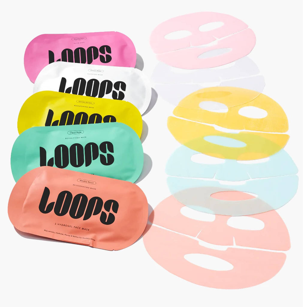 Colorful packaging with LOOPS face masks on a white background.