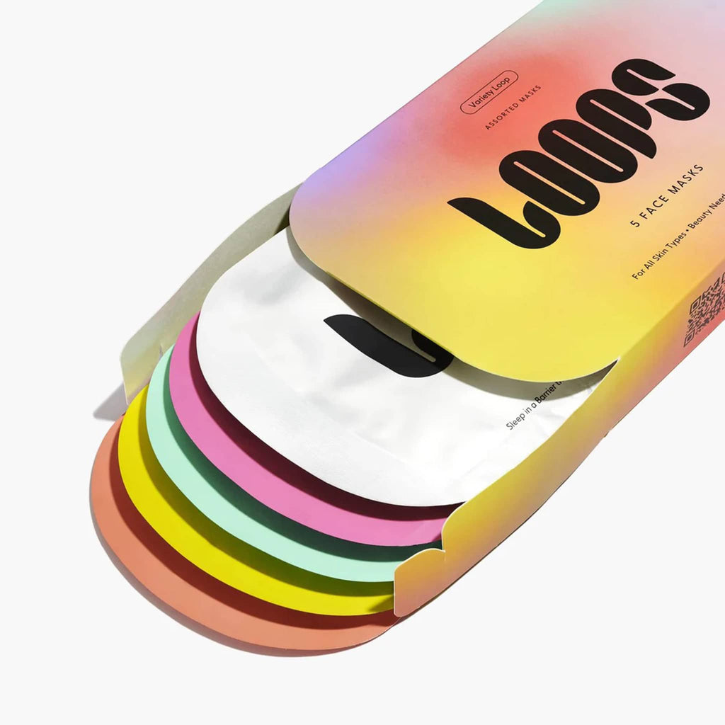 Set of colorful face masks in a branded box on a white background.