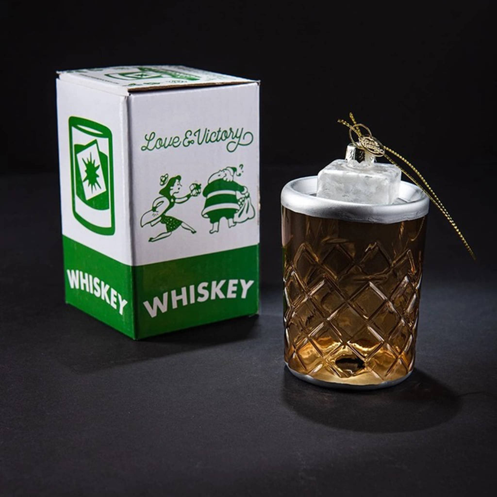 Love and Victory Whiskey on the Rocks hand-blown, hand-painted glass holiday cocktail ornament with green and white box packaging.