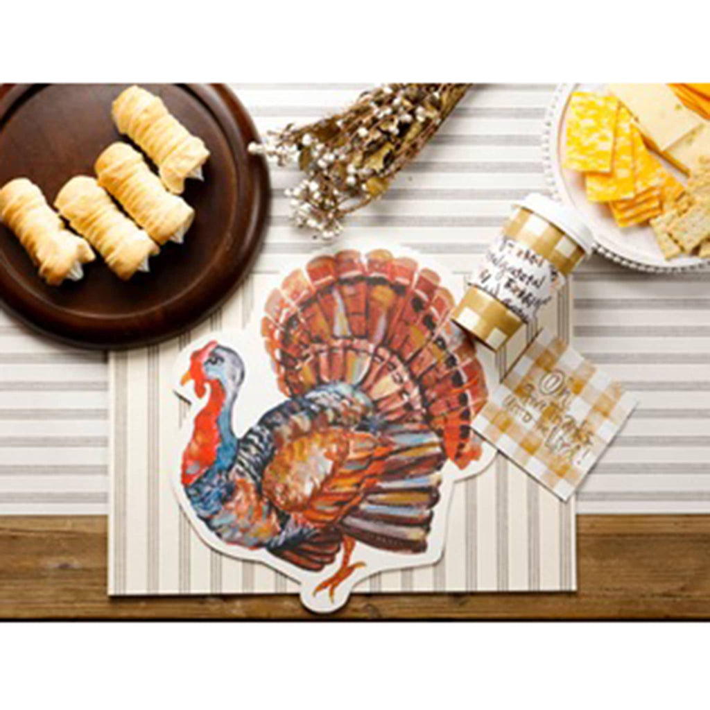 Thanksgiving-themed placemat with a turkey design on a table setting.