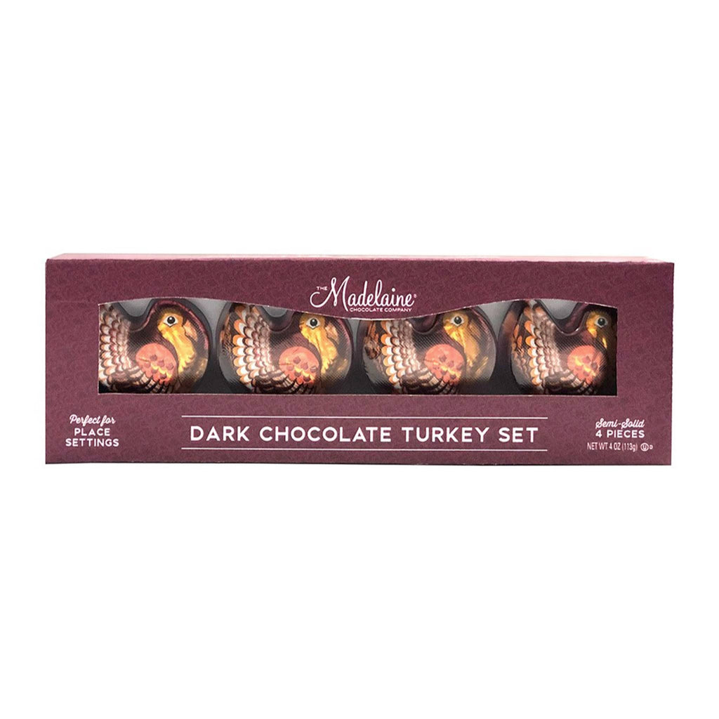 Box of dark chocolate turkeys with 'Madeleine' branding on a white background.