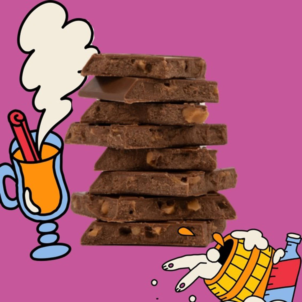 Maeve Hot Buttery Rum milk chocolate truffle bar squares stacked to show inside, on a purple illustrated background.