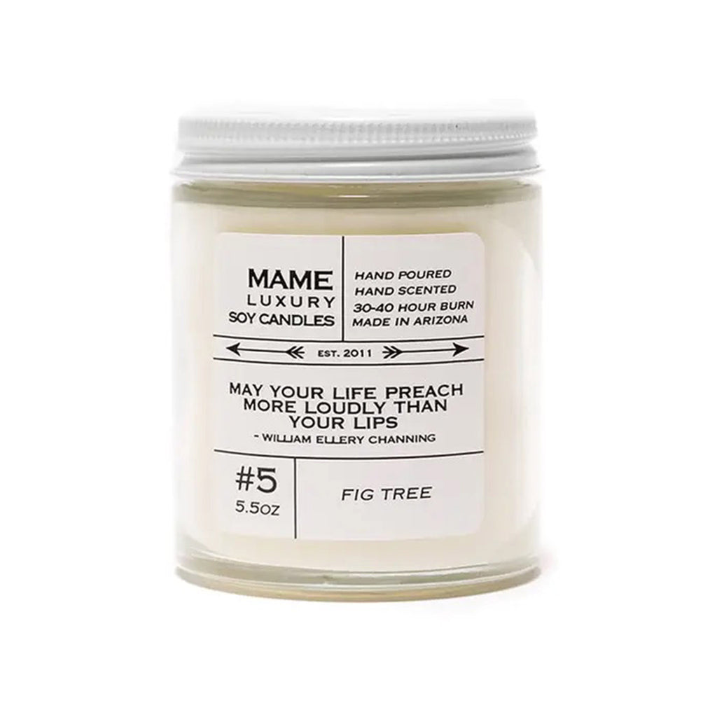 MAME Luxury 5.5 ounce soy wax candle, #5 "May your life preach more loudly than your lips" William Ellery Channing quote candle with a fig tree scent in a clear glass apothecary jar with white lid.
