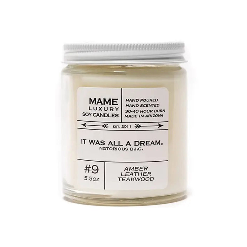 MAME Luxury 5.5 ounce soy wax candle, #9 "It was all a dream" Notorious B.I.G. quote candle with an amber, leather and teakwood scent in a clear glass apothecary jar with white lid.
