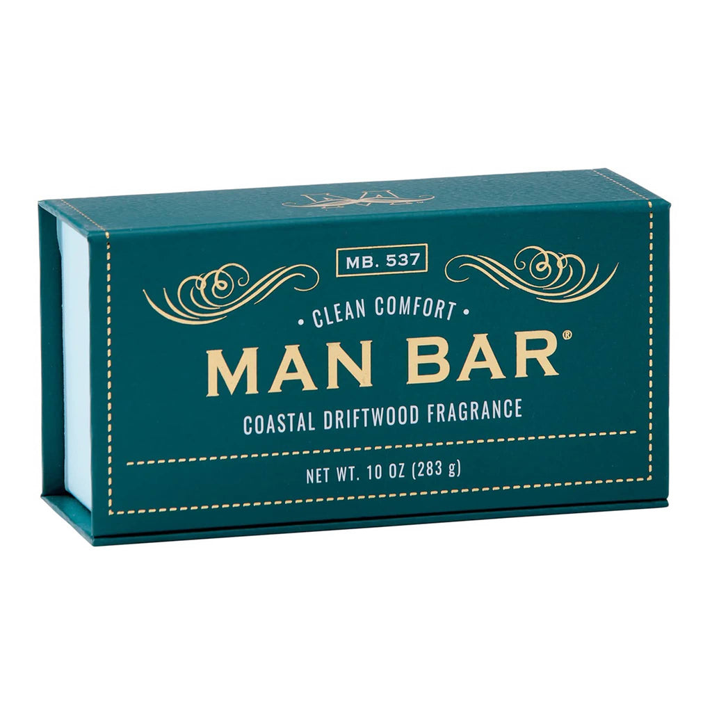 Man Bar Clean Comfort Coastal Driftwood scented bar soap in teal packaging, front angle view.