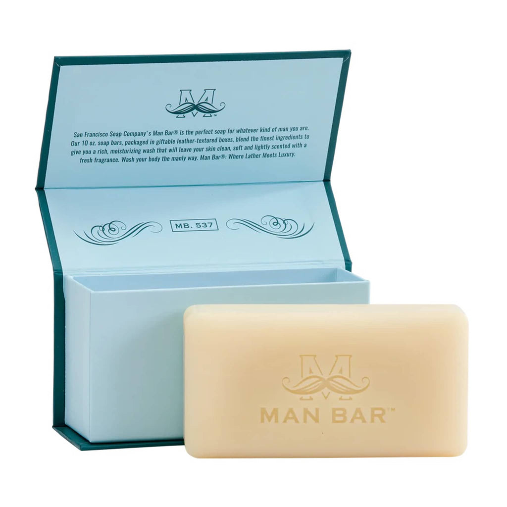 Man Bar Clean Comfort Coastal Driftwood scented bar soap in teal packaging, open with bar of soap in front.