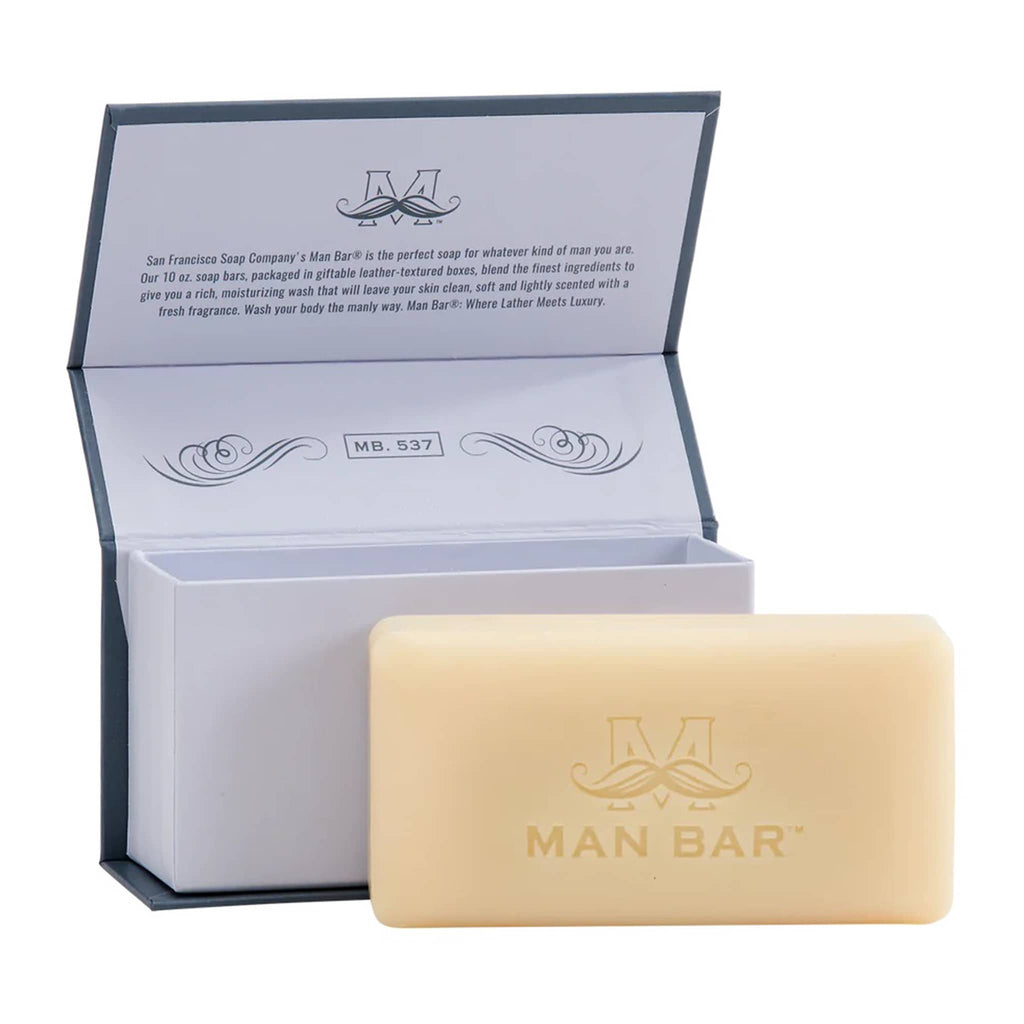 Man Bar Refreshing Peppered Patchouli scented bar soap in navy blue packaging, open with soap in front.