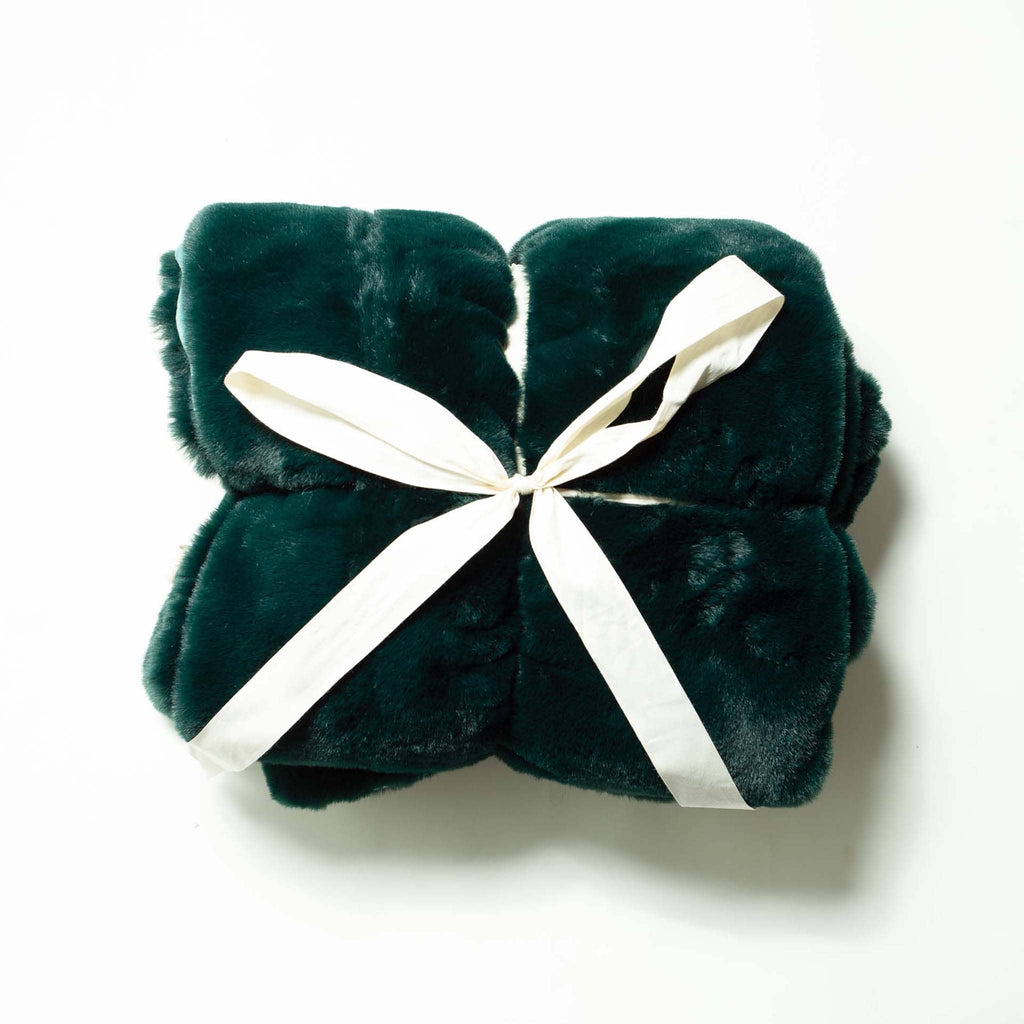 MERSEA Cozy Cabin Faux Fur Throw Blanket in pine green in ribbon tie packaging.