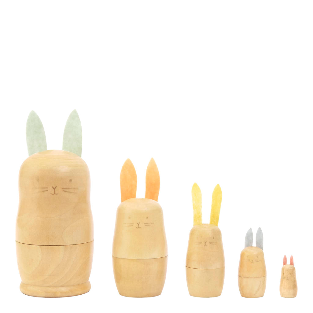 Meri Meri wood stacking bunnies toy, set of five shown in a row.