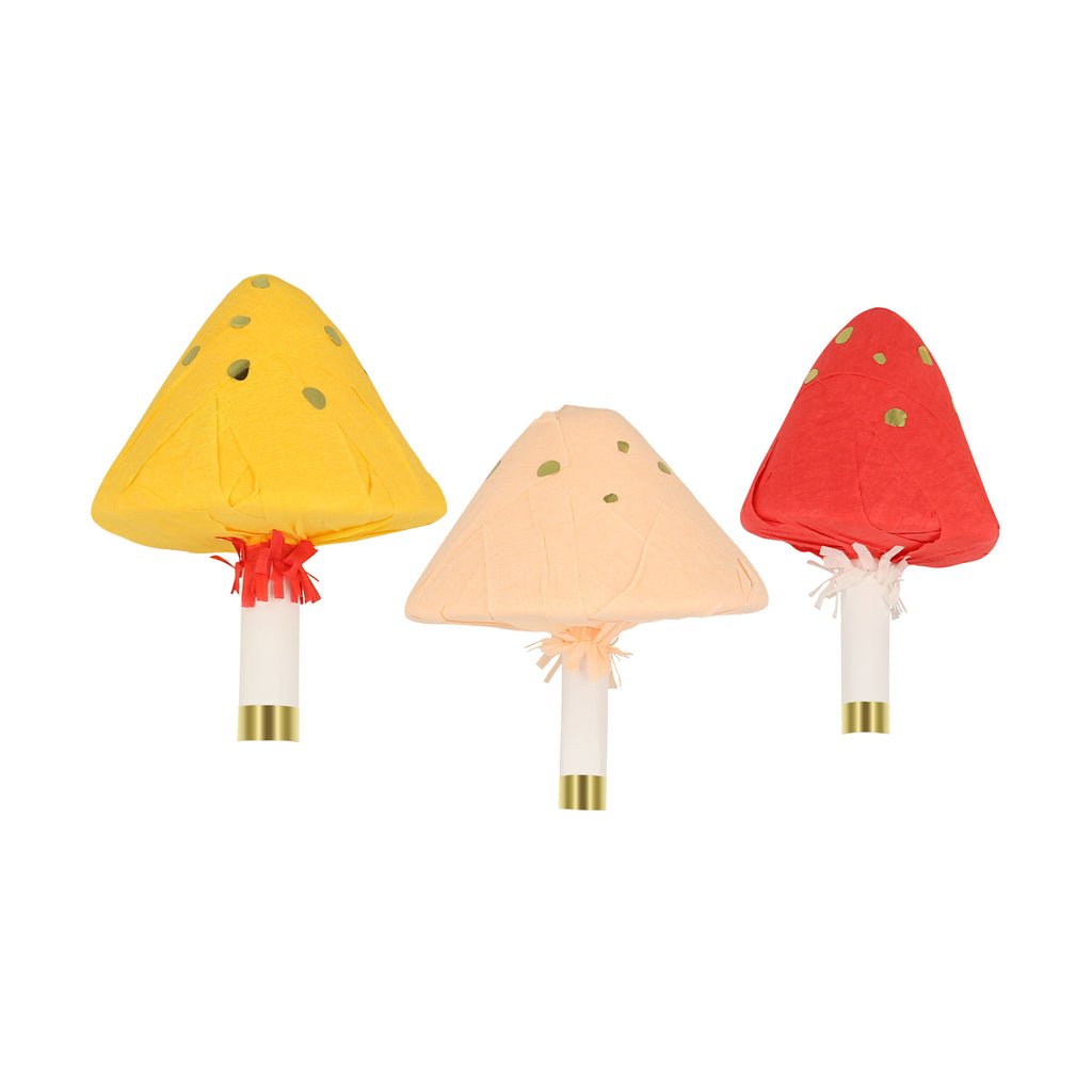 Meri Meri Surprise Mushrooms in mustard yellow, peach and red with white stems, fringe detail and gold foil accents.