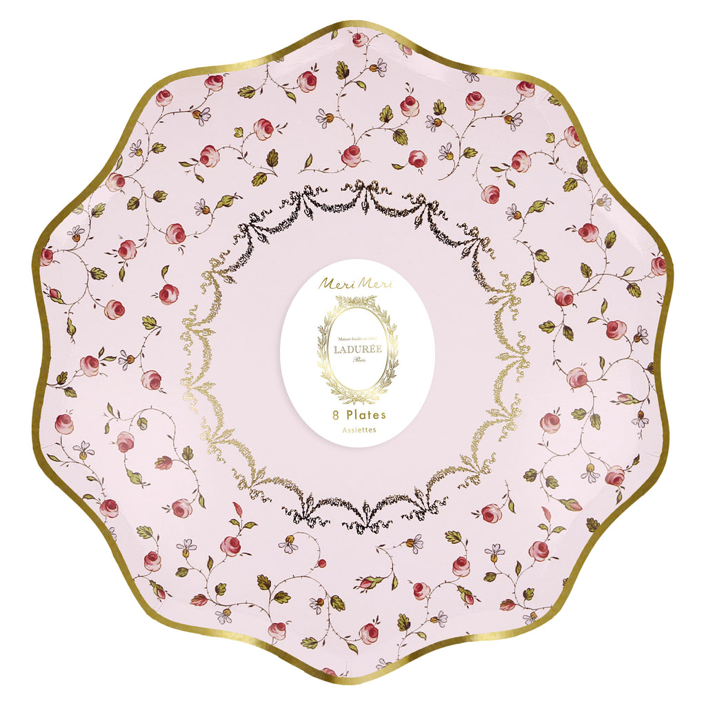 Meri Meri x Laduree Marie Antoinette light pink rosebud floral paper party dinner plates with gold foil details and scalloped border in packaging.