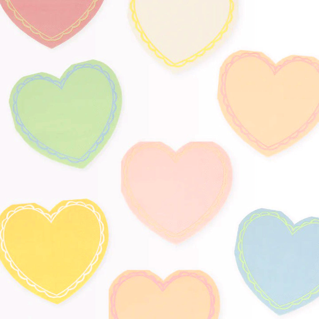 Meri Meri small pastel heart valentines day party napkins with contrasting color trim in a scalloped edge pattern.
