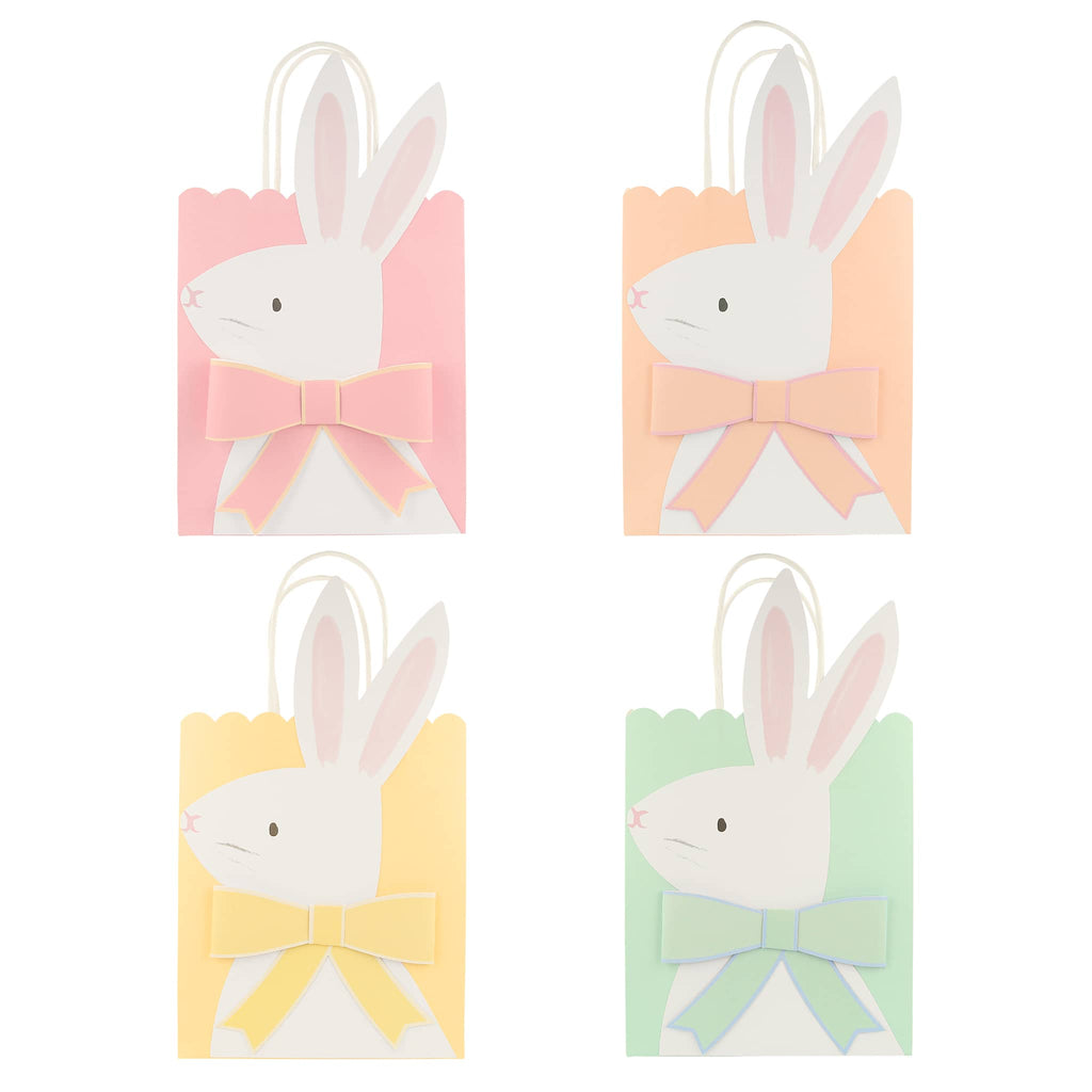 Meri Meri easter paper party favor bags in pink, orange, yellow and green.