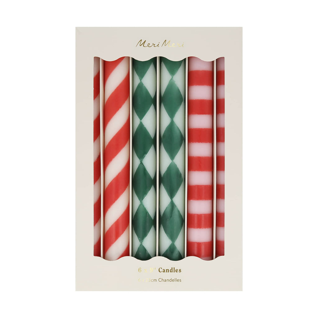 Meri Meri Festive Stripe unscented red and green patterned unscented candles in box packaging, front view.