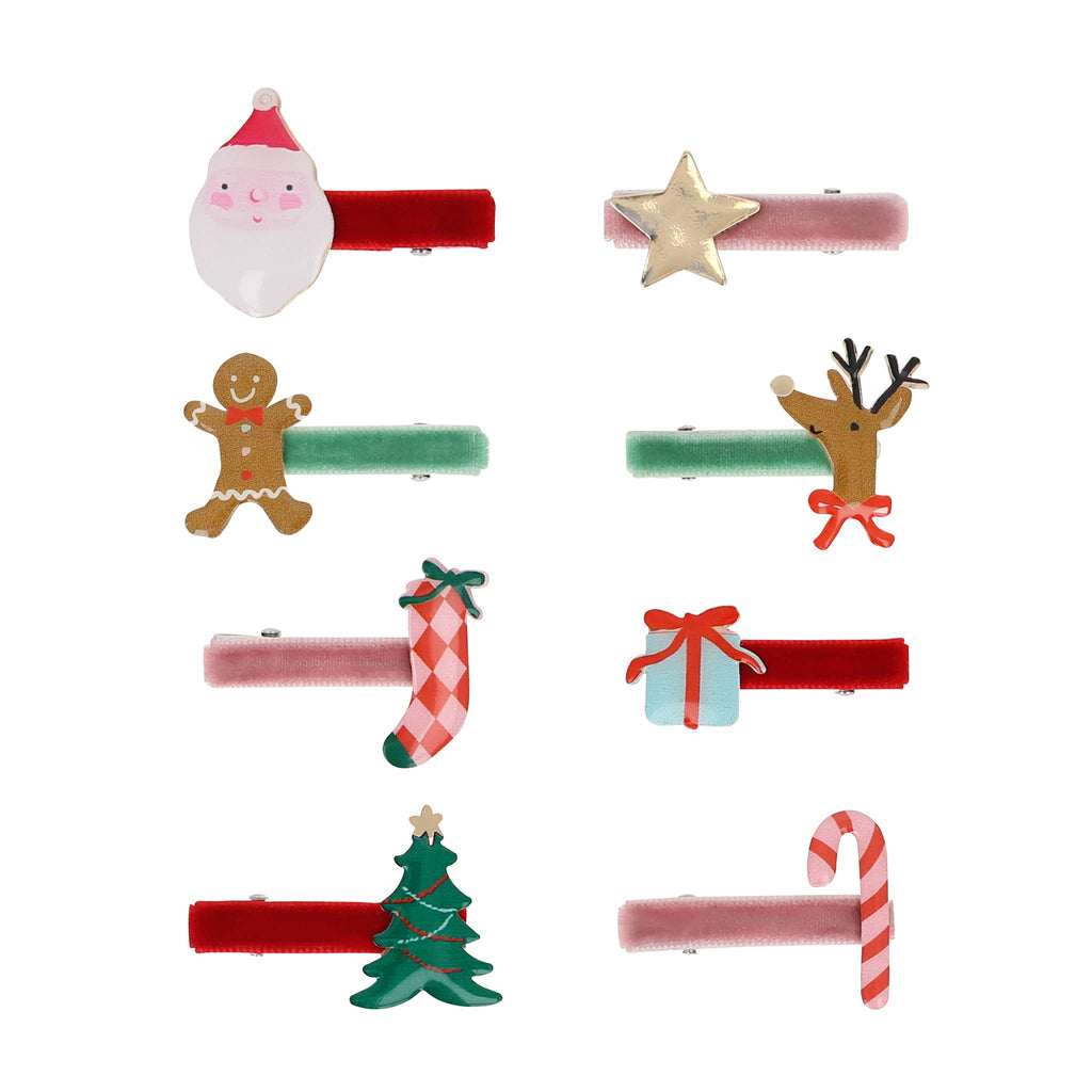 Set of Christmas-themed hair clips on a white background.