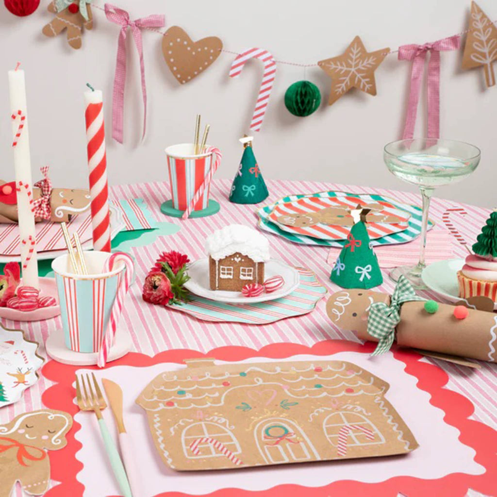 Meri Meri Gingerbread House Shaped Paper Party Plate in party setting.