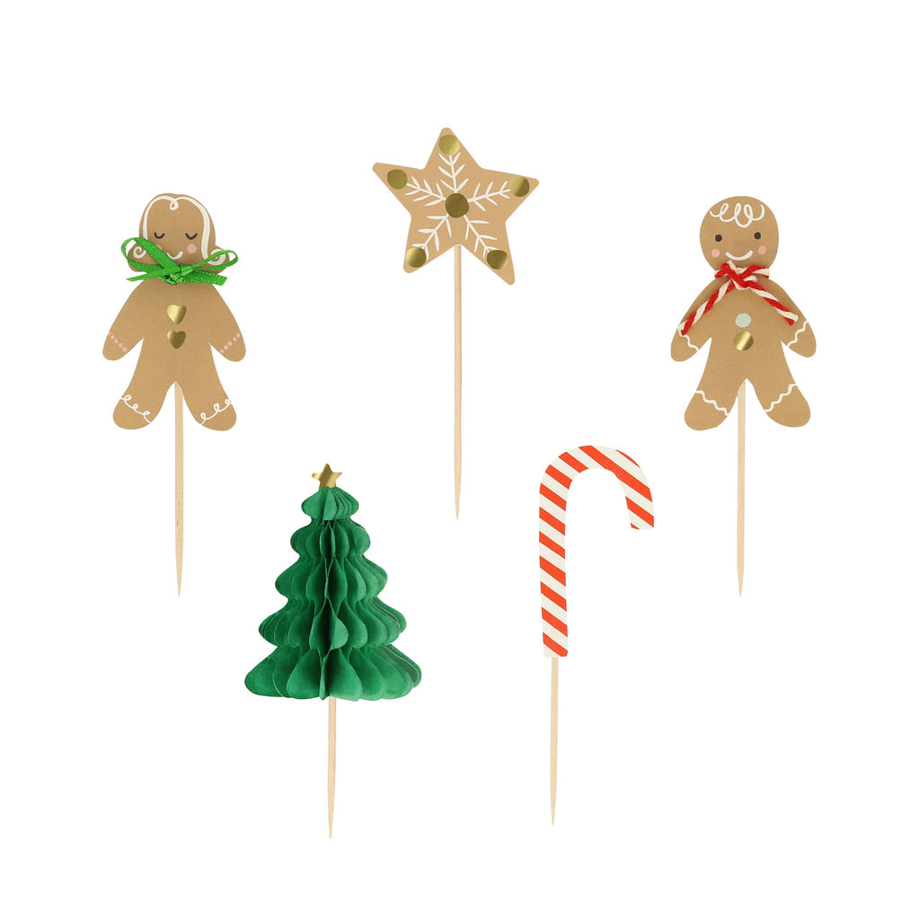 Meri Meri Gingerbread Cupcake Kit with toppers in gingerbread people, star, tree and candy cane designs.