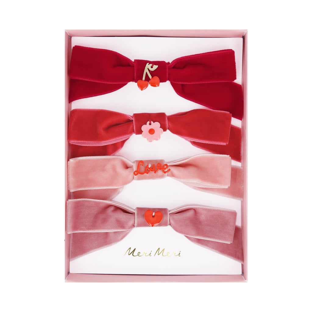 Meri Meri Velvet Bows with enamel charms hair clips, set of 4 in box packaging.