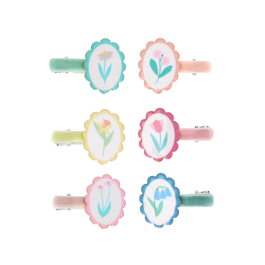 Meri Meri Flower Cameo Hair Clips, set of 6, each in a different color with different flower illustration in middle of a scalloped edge cameo.