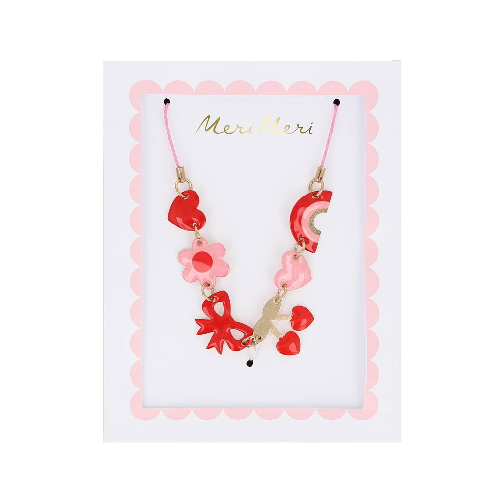 Meri Meri Hearts and Cherries enamel charm necklace in box packaging.