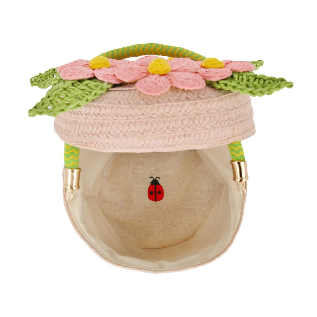 Meri Meri Flower Pot woven paper basket bag with handle, overhead view, lid open.