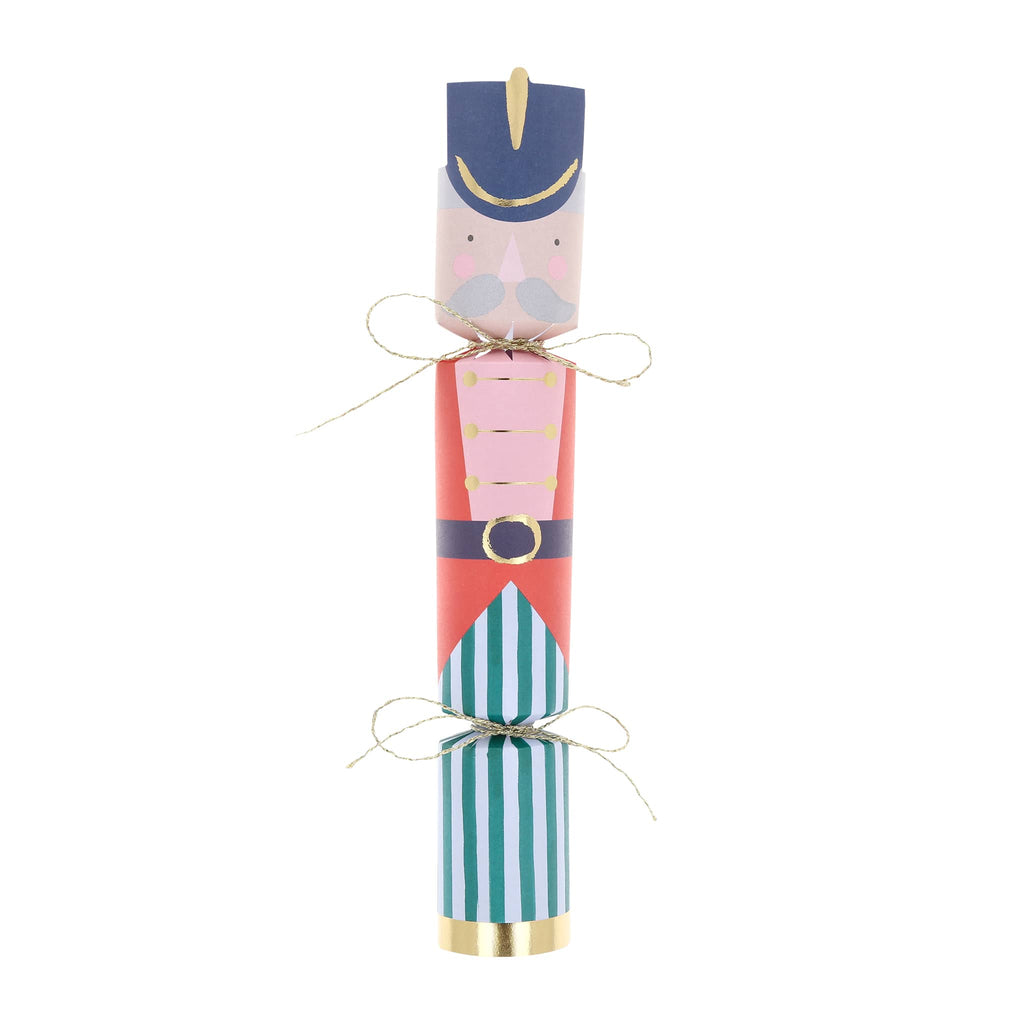 Holiday cracker with nutcracker soldier design on a white background.