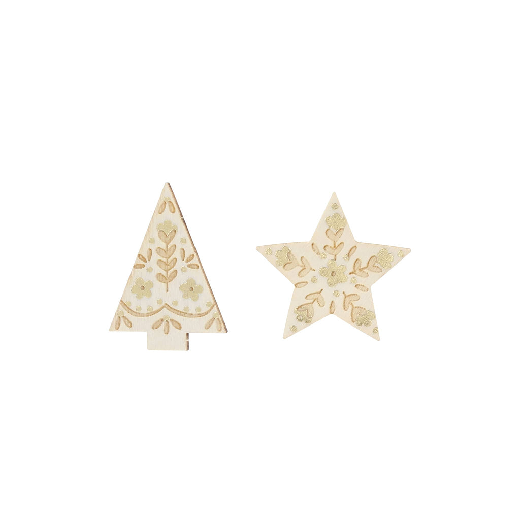 Decorative wooden tree and star brooches with floral patterns on a white background.