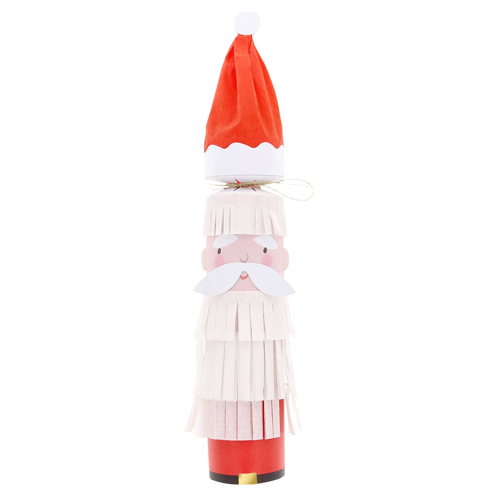 Paper Santa cracker with red hat and white fringe beard and hair, on a white background.
