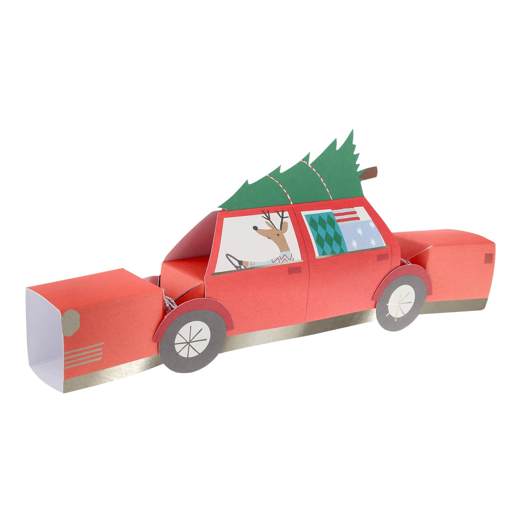 Red paper car with a Christmas tree on a white background.