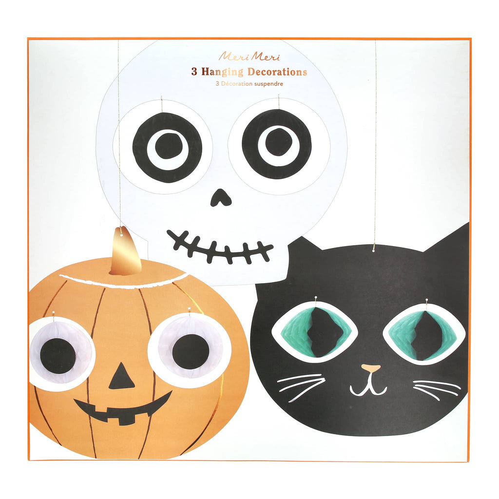 Halloween-themed decorations featuring a pumpkin, skull, and black cat head on front of packaging, on a white background.