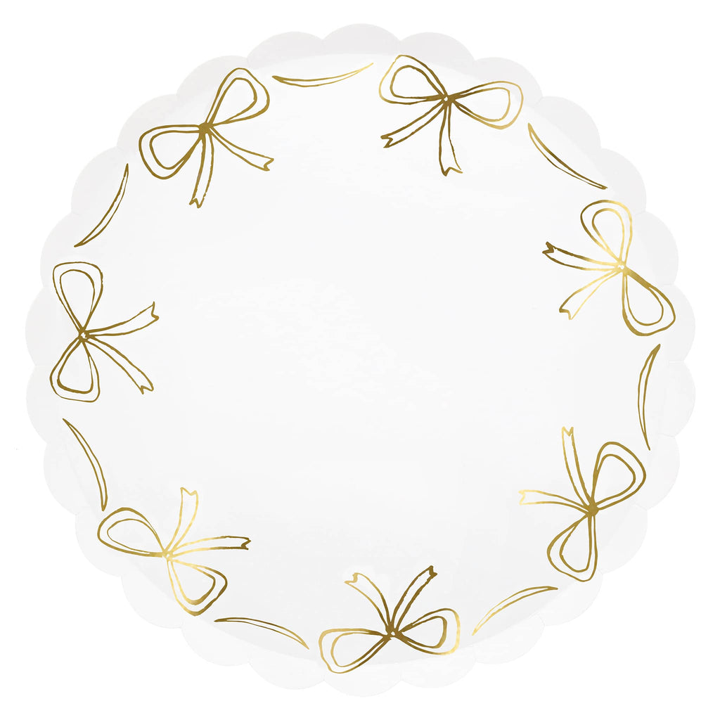 Decorative paper plates with gold bow designs on a white background.