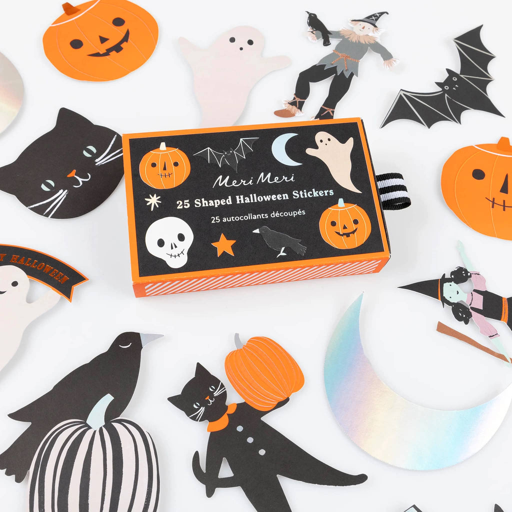 Box of Meri Meri Halloween stickers with various shaped stickers on a white background.