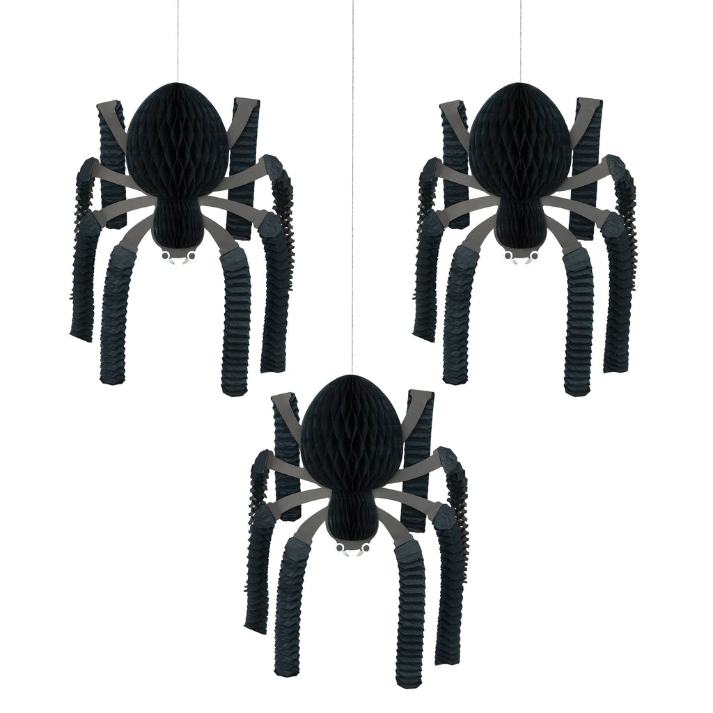 Three black honeycomb spider decorations hanging against a white background.