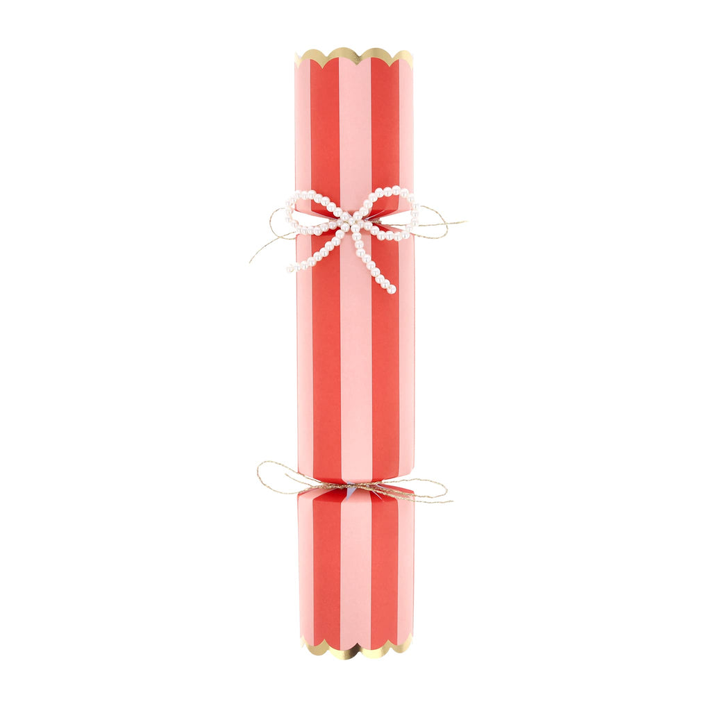 Red and pink striped cracker with white beaded bow.