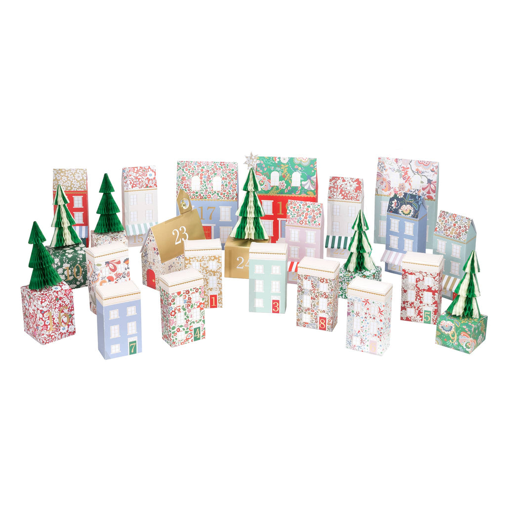 Set of Christmas-themed advent calendar box shaped houses with floral prints and numbers and honeycomb trees on a white background.
